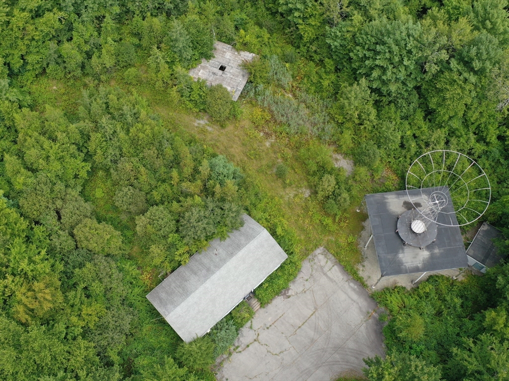 27 Douglas Road Webster, MA 01570 - Photo 18 of 19 an aerial view of a house with a yard and garden