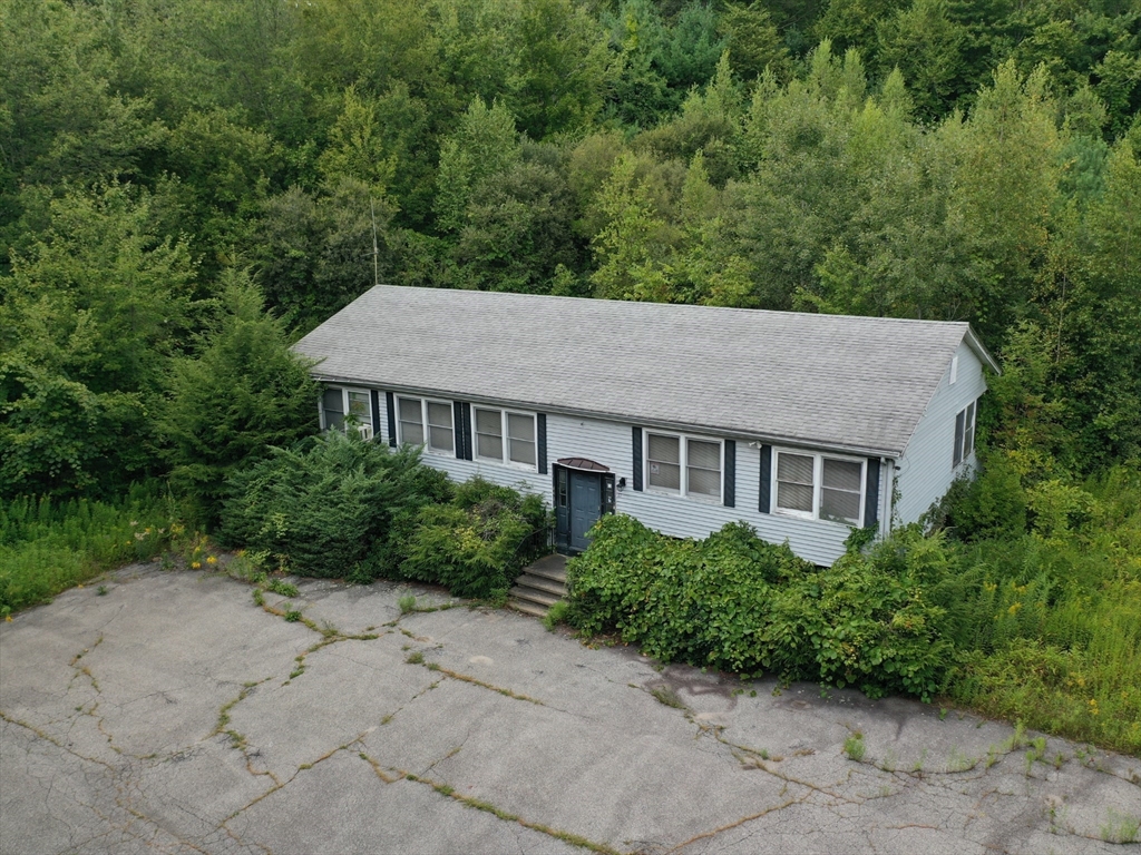 27 Douglas Road Webster, MA 01570 - Photo 4 of 19 an aerial view of a house