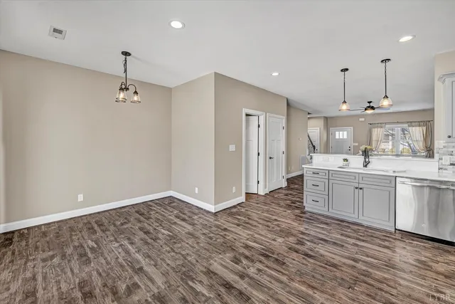 a view of a storage and utility room with washer and dryer