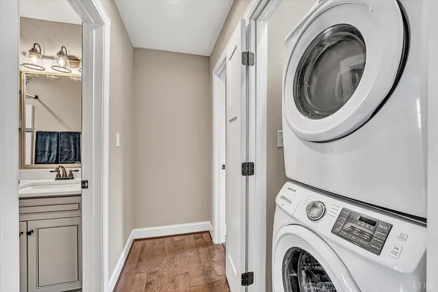 an empty room with a ceiling fan and a window