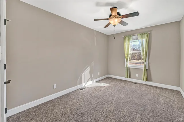a bathroom with a double vanity sink mirror double and toilet