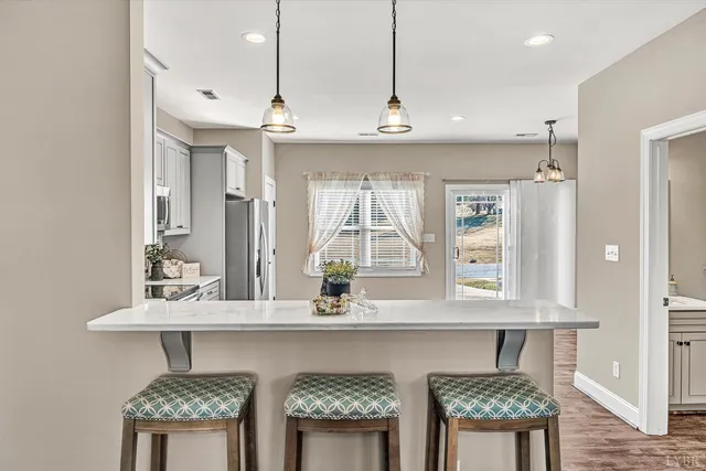 a kitchen with a stove and a microwave