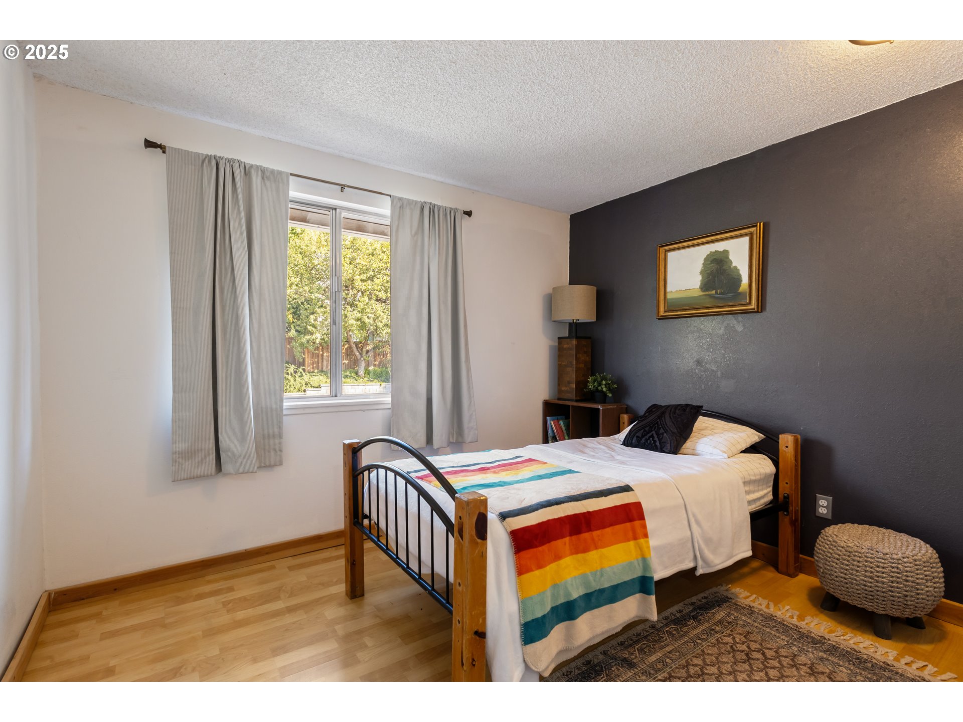 930 Prescott Lane Springfield, OR 97477 - Photo 13 of 31 a bedroom with a bed and a window