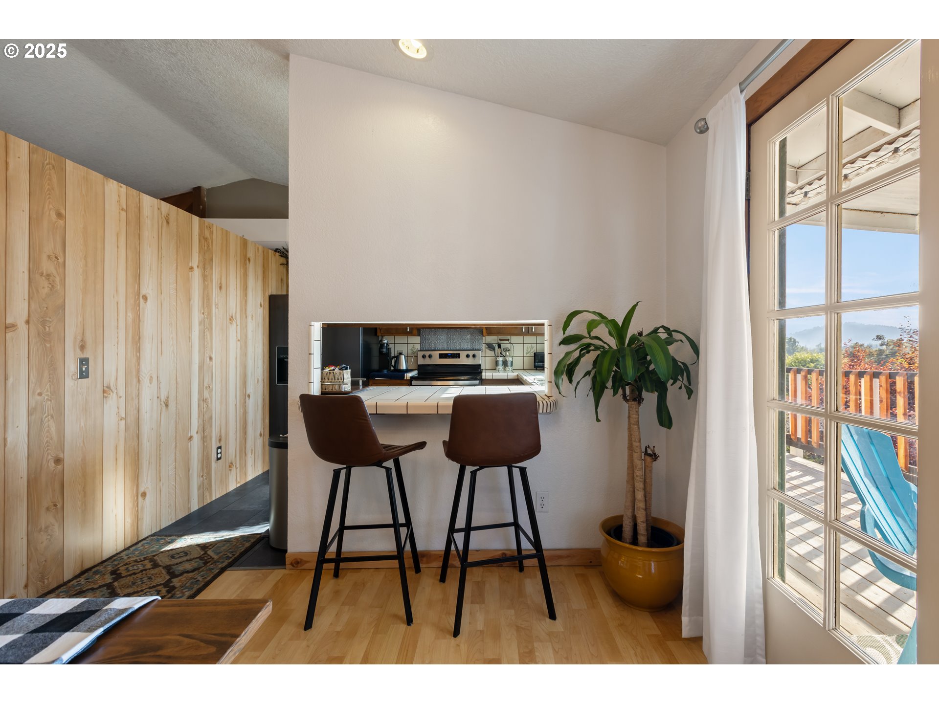 930 Prescott Lane Springfield, OR 97477 - Photo 9 of 31 a picture of table and chairs with wooden floor