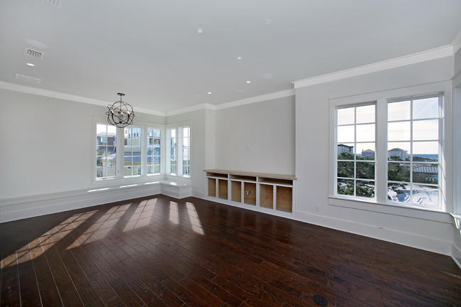 Lot 8 Tresca Place Santa Rosa Beach, FL 32459 - Photo 14 of 43 a view of an empty room with wooden floor and a window