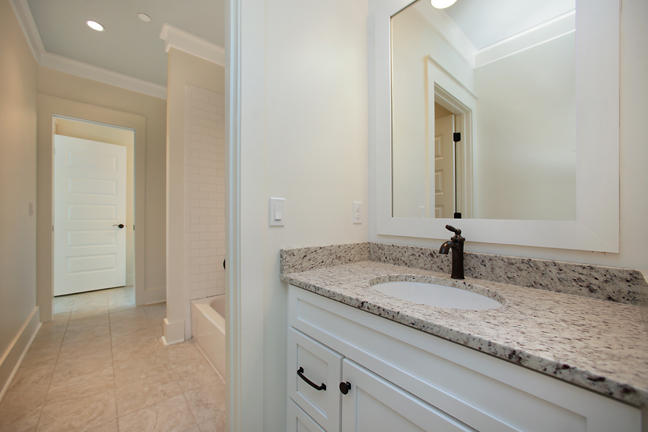 Lot 8 Tresca Place Santa Rosa Beach, FL 32459 - Photo 25 of 43 a bathroom with a granite countertop sink and a mirror