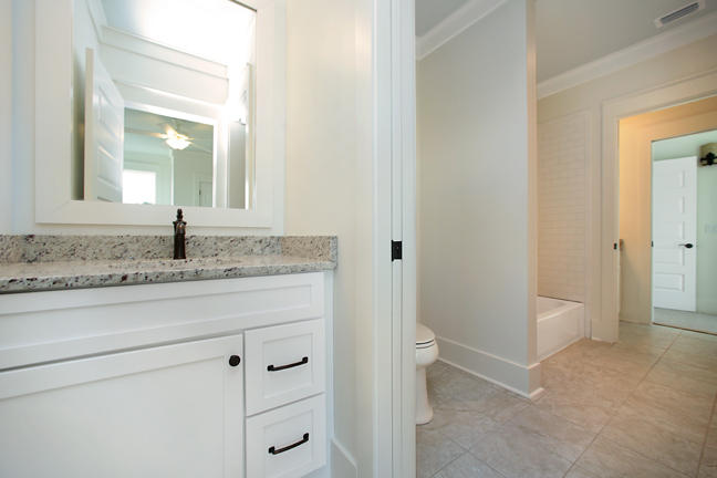Lot 8 Tresca Place Santa Rosa Beach, FL 32459 - Photo 28 of 43 a bathroom with a granite countertop sink and mirror