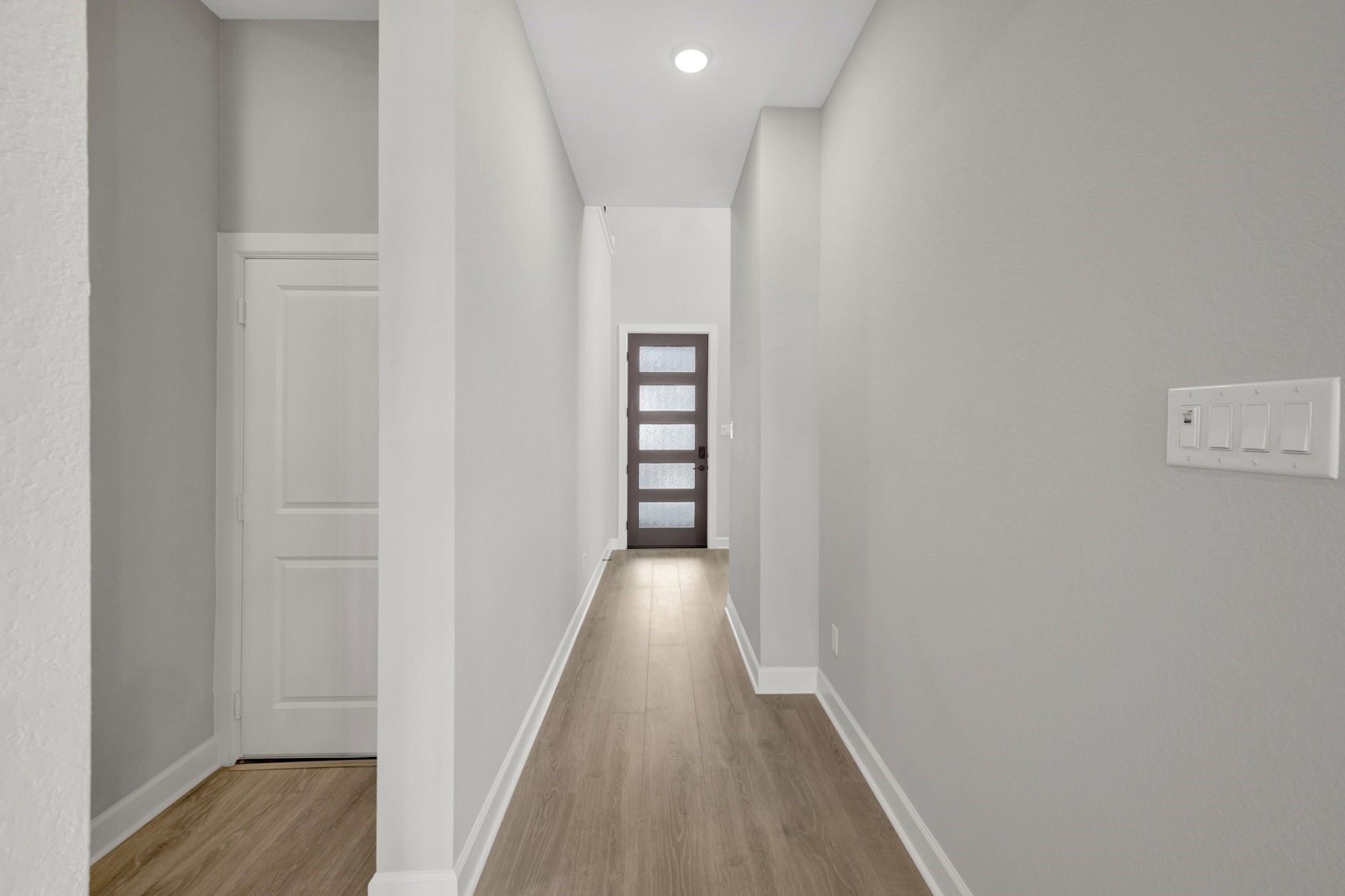 5407 Mango Blfs Street Manvel, TX 77578 - Photo 12 of 50 a view of a hallway with wooden floor