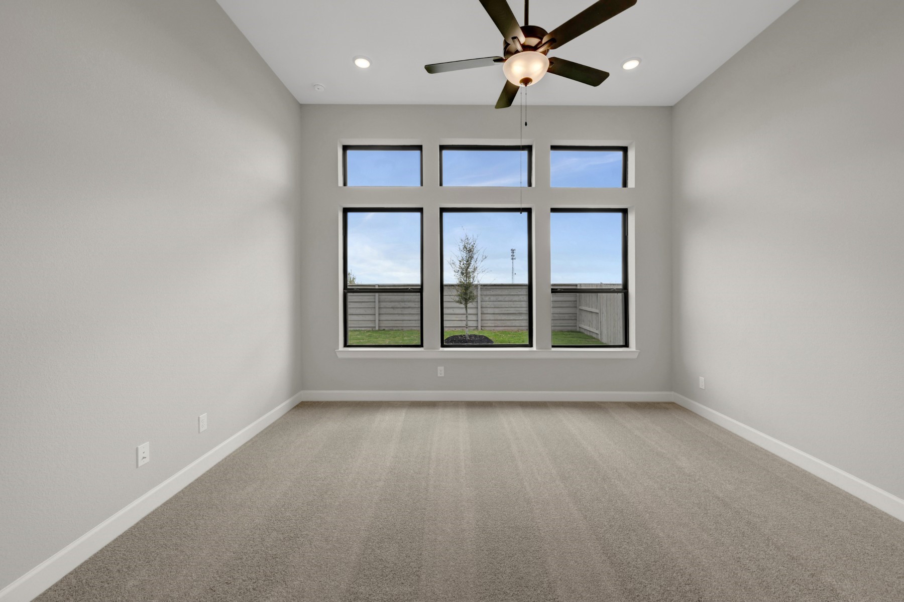 5407 Mango Blfs Street Manvel, TX 77578 - Photo 32 of 50 a view of livingroom with a ceiling fan and window