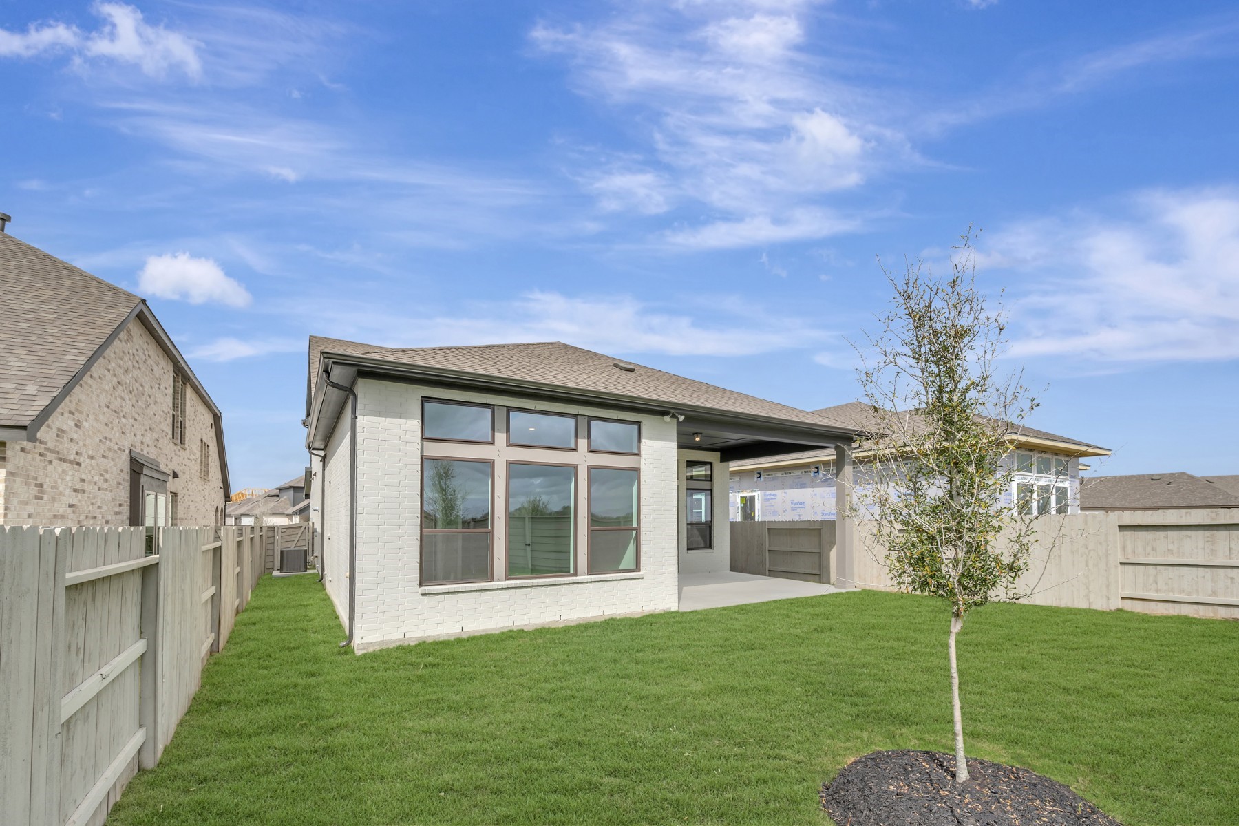 5407 Mango Blfs Street Manvel, TX 77578 - Photo 7 of 50 a house view with a garden space