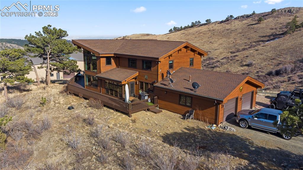 4528 Sheep Patch Road Golden, CO 80403 - Photo 2 of 40 an aerial view of a house with a yard