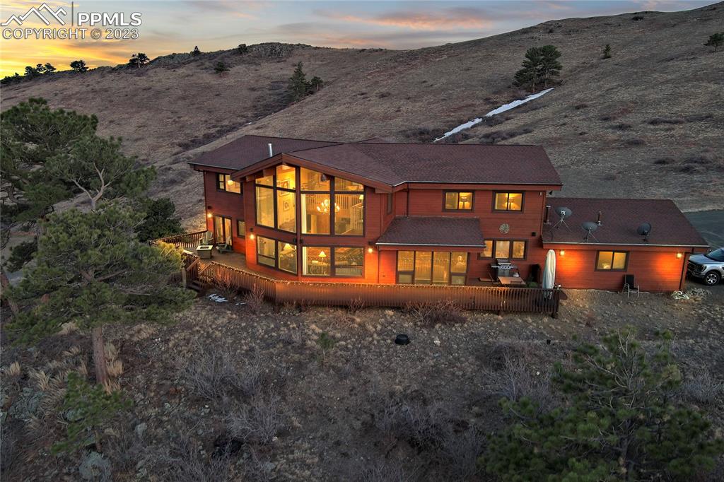4528 Sheep Patch Road Golden, CO 80403 - Photo 39 of 40 front view of a house with a yard