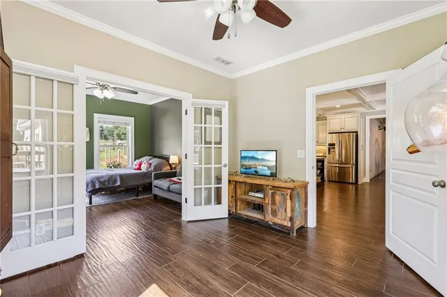 a bedroom with a bed and a table