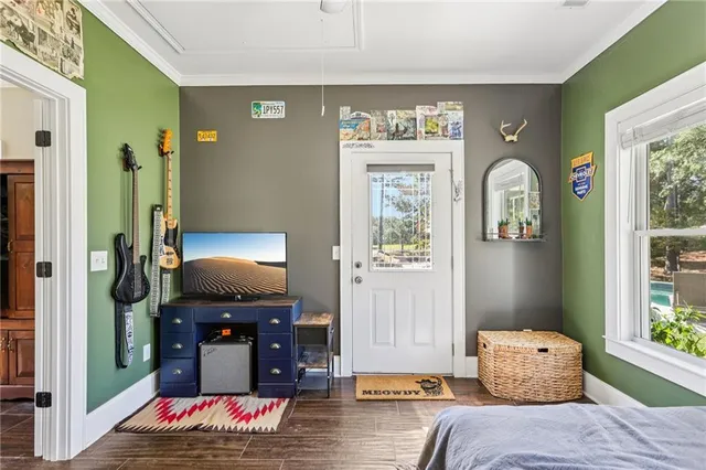 a bedroom with a bed and furniture