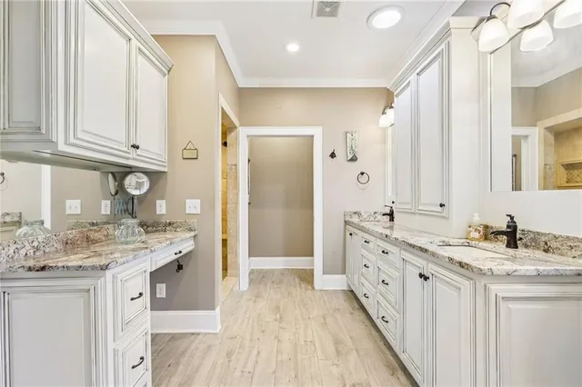 a view of a patio with couches and potted plants