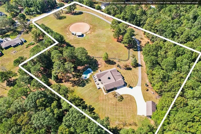 a view of a chairs and table in a patio