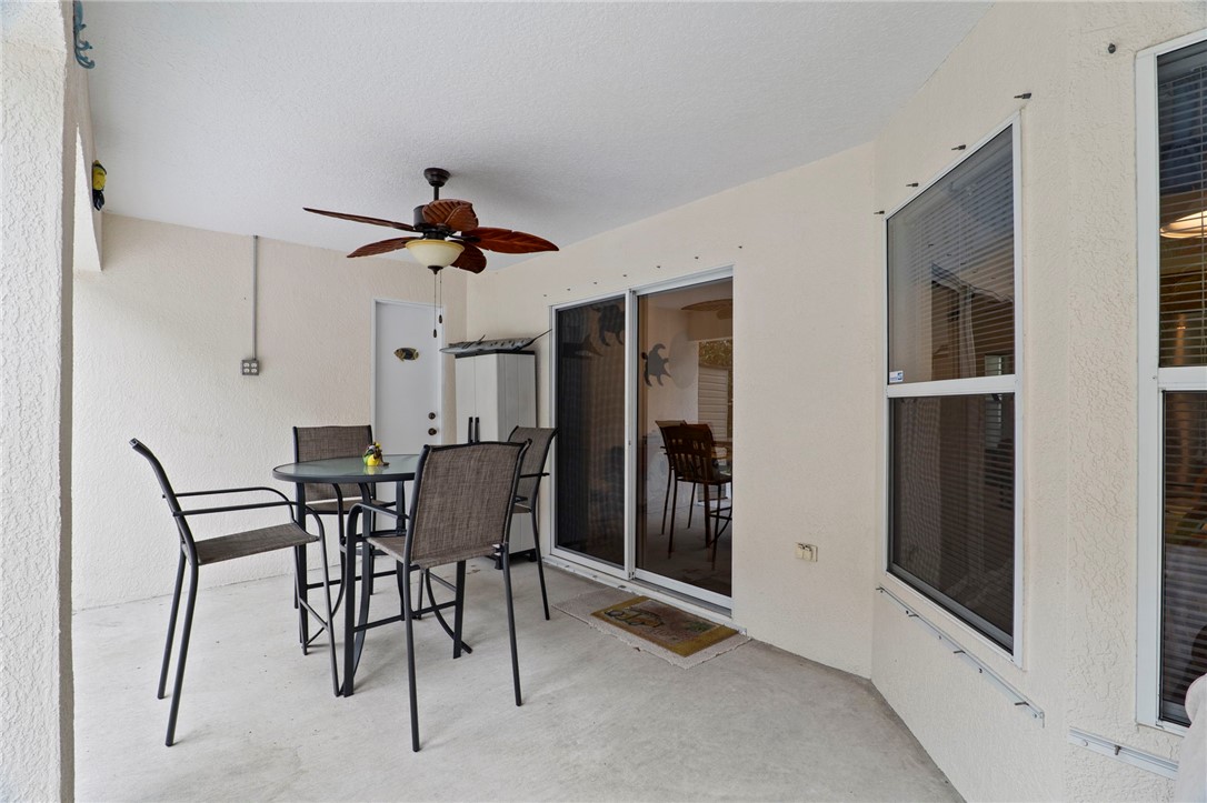 934 Bermuda Avenue Sebastian, FL 32958 - Photo 6 of 31 a dining room with furniture and a window