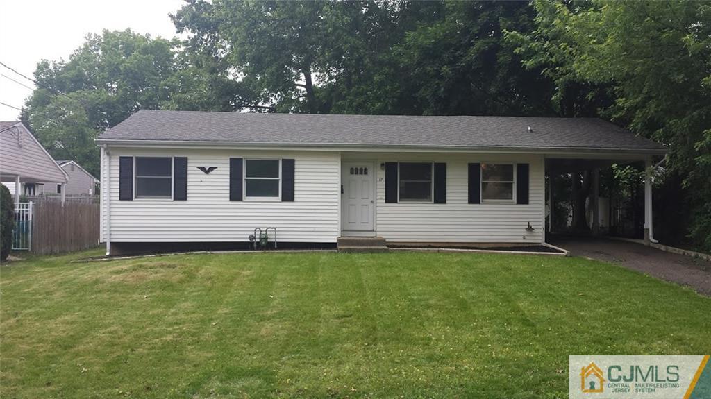 17 Columbia Road Old Bridge, NJ 08859 - Photo 1 of 6 a view of a house with a backyard