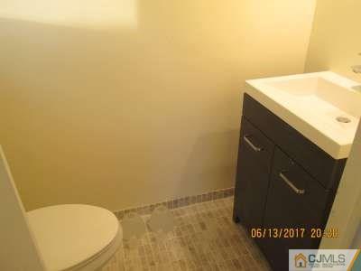 17 Columbia Road Old Bridge, NJ 08859 - Photo 4 of 6 a bathroom with a sink and a toilet