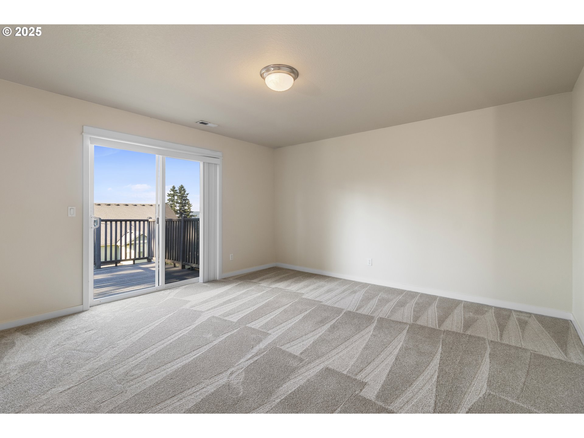 14822 Southeast Natalya Street Happy Valley, OR 97086 - Photo 28 of 48 a view of an empty room with wooden floor and a window