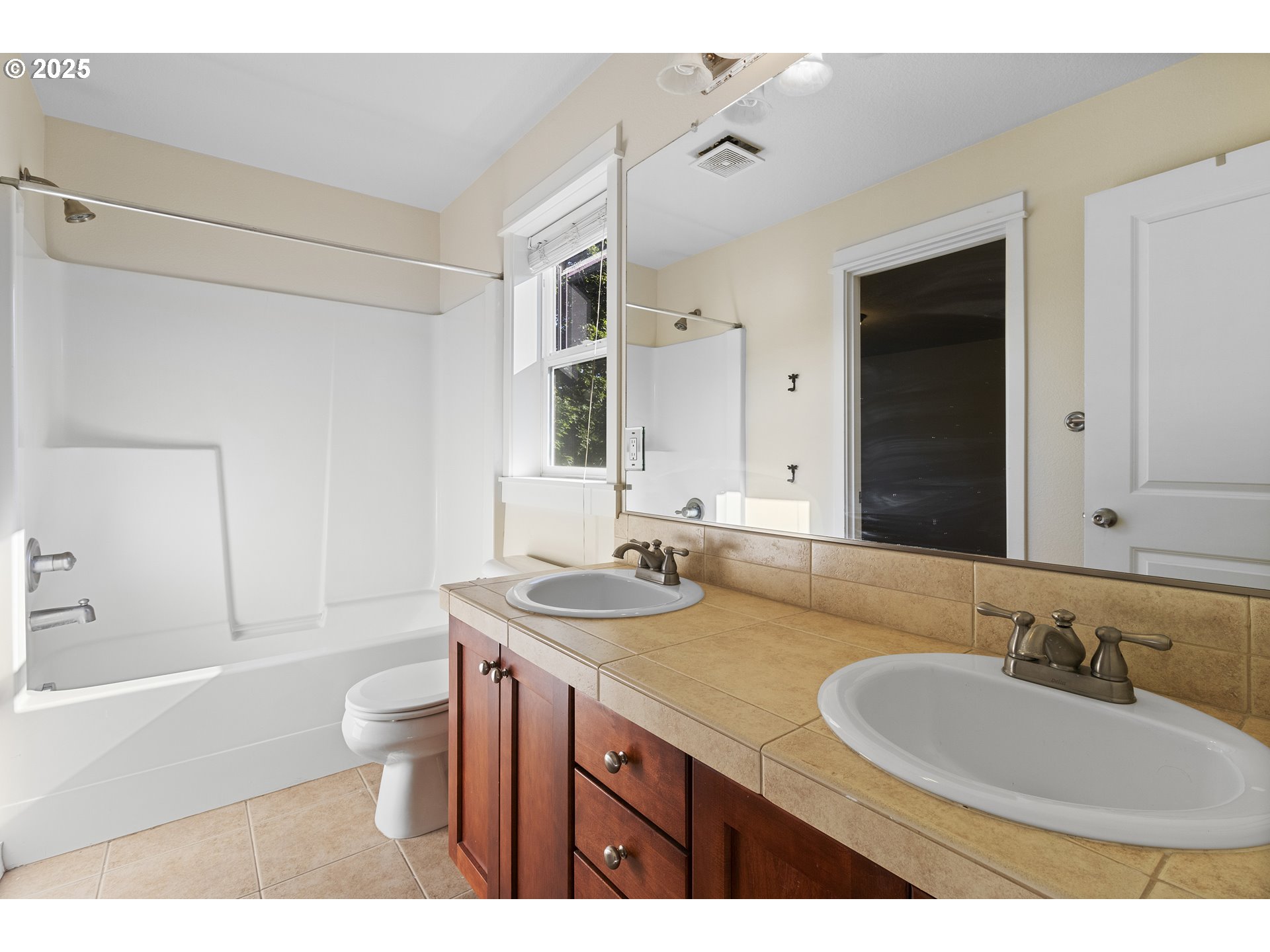 14822 Southeast Natalya Street Happy Valley, OR 97086 - Photo 38 of 48 a bathroom with a sink and a mirror