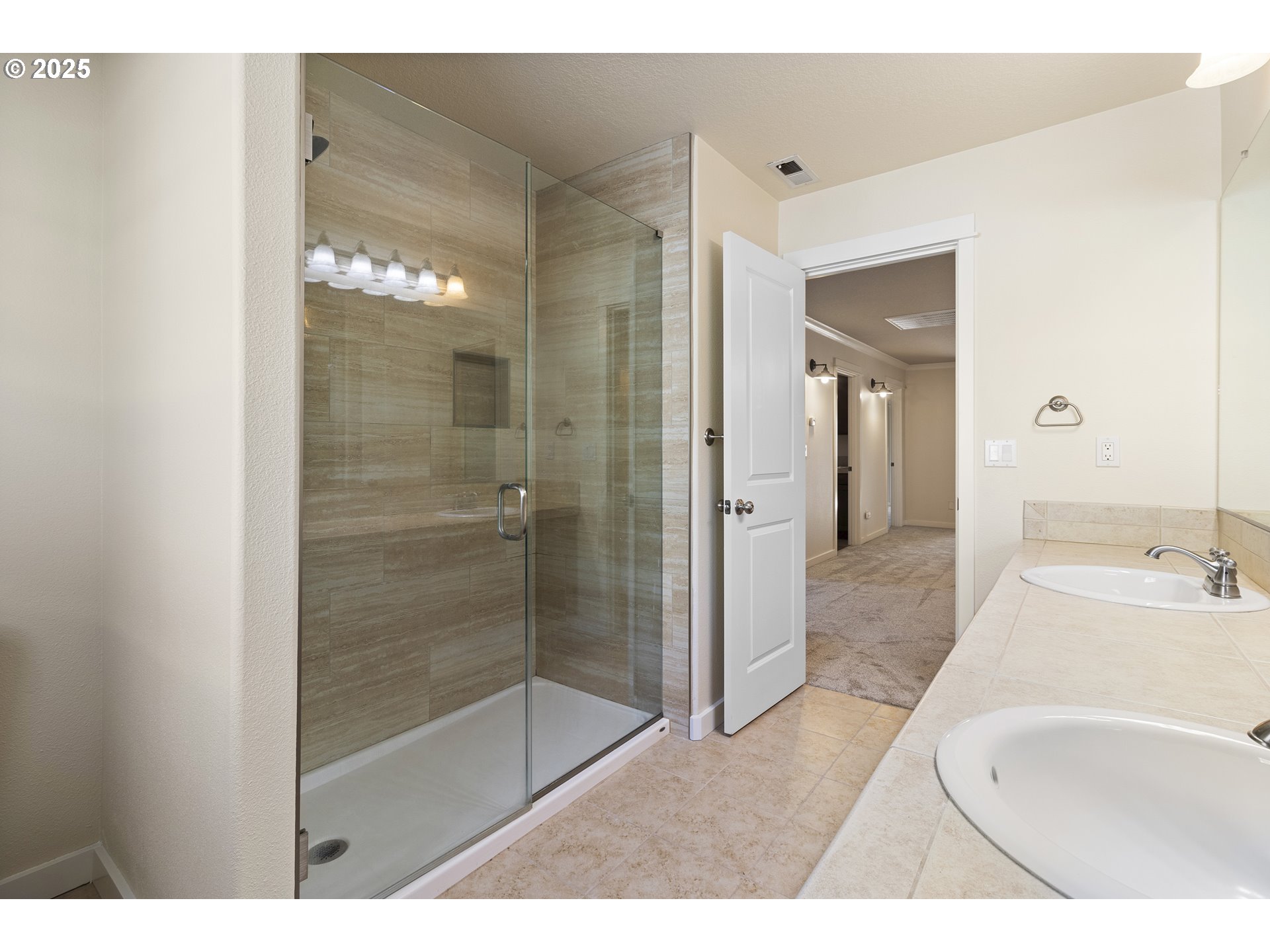 14822 Southeast Natalya Street Happy Valley, OR 97086 - Photo 43 of 48 a bathroom with a bathtub and a shower