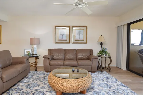 a view of a living room and dining room