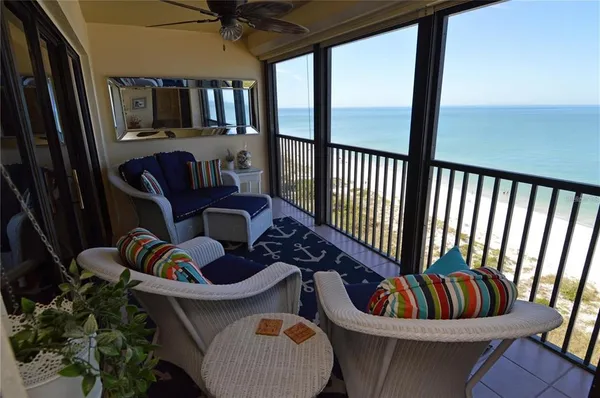 a bedroom with two beds and a window