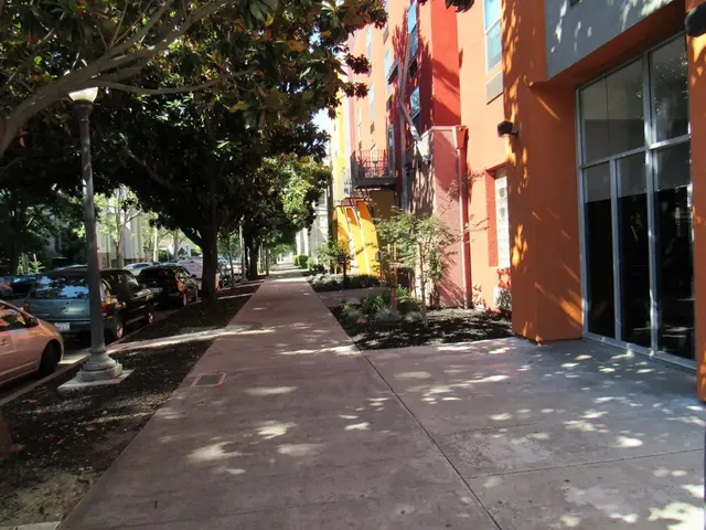 a view of a street with houses