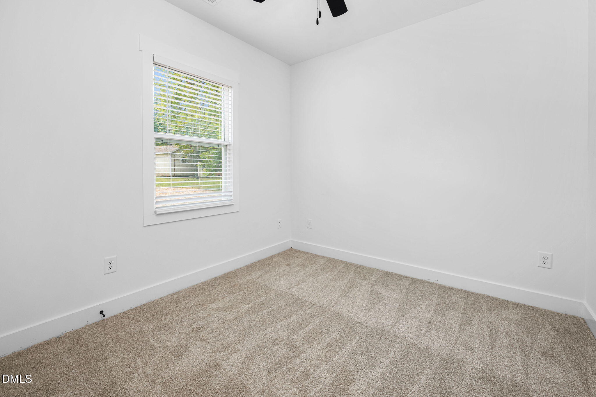305 West Barden Street Roxboro, NC 27573 - Photo 22 of 31 an empty room with a window