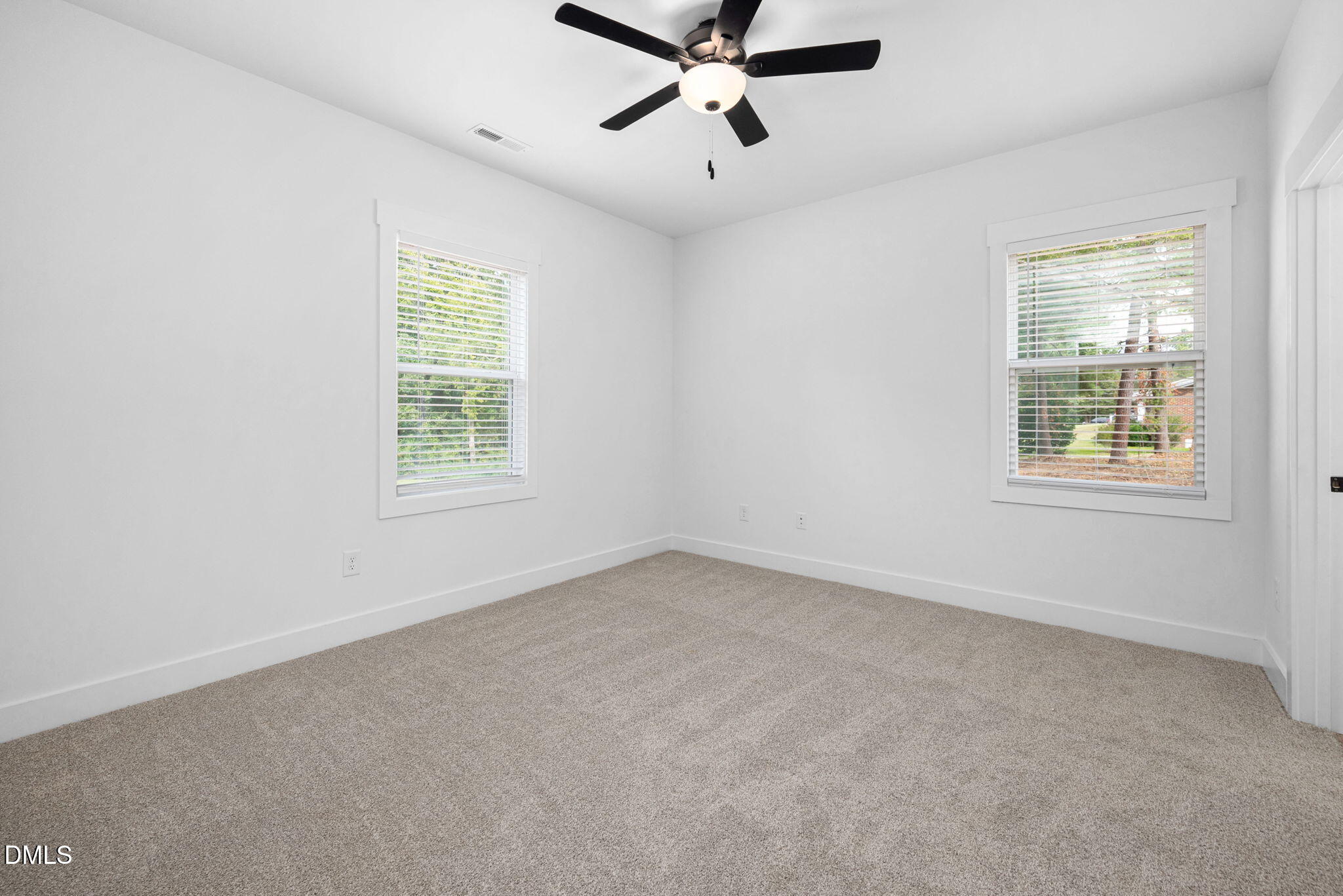 305 West Barden Street Roxboro, NC 27573 - Photo 25 of 31 an empty room with a window