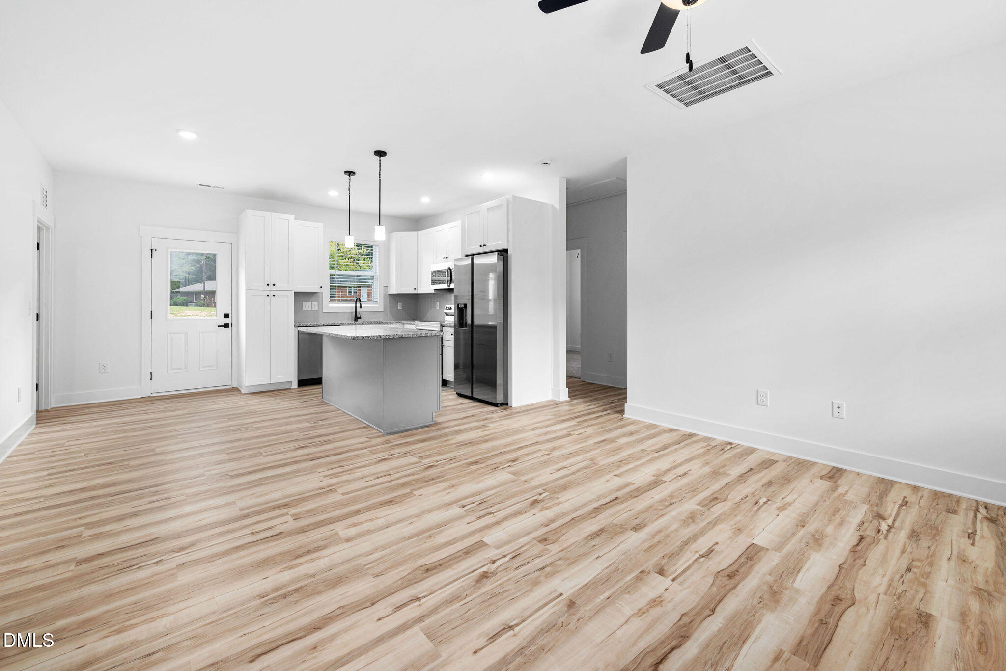 305 West Barden Street Roxboro, NC 27573 - Photo 9 of 31 a view of a kitchen and dining room