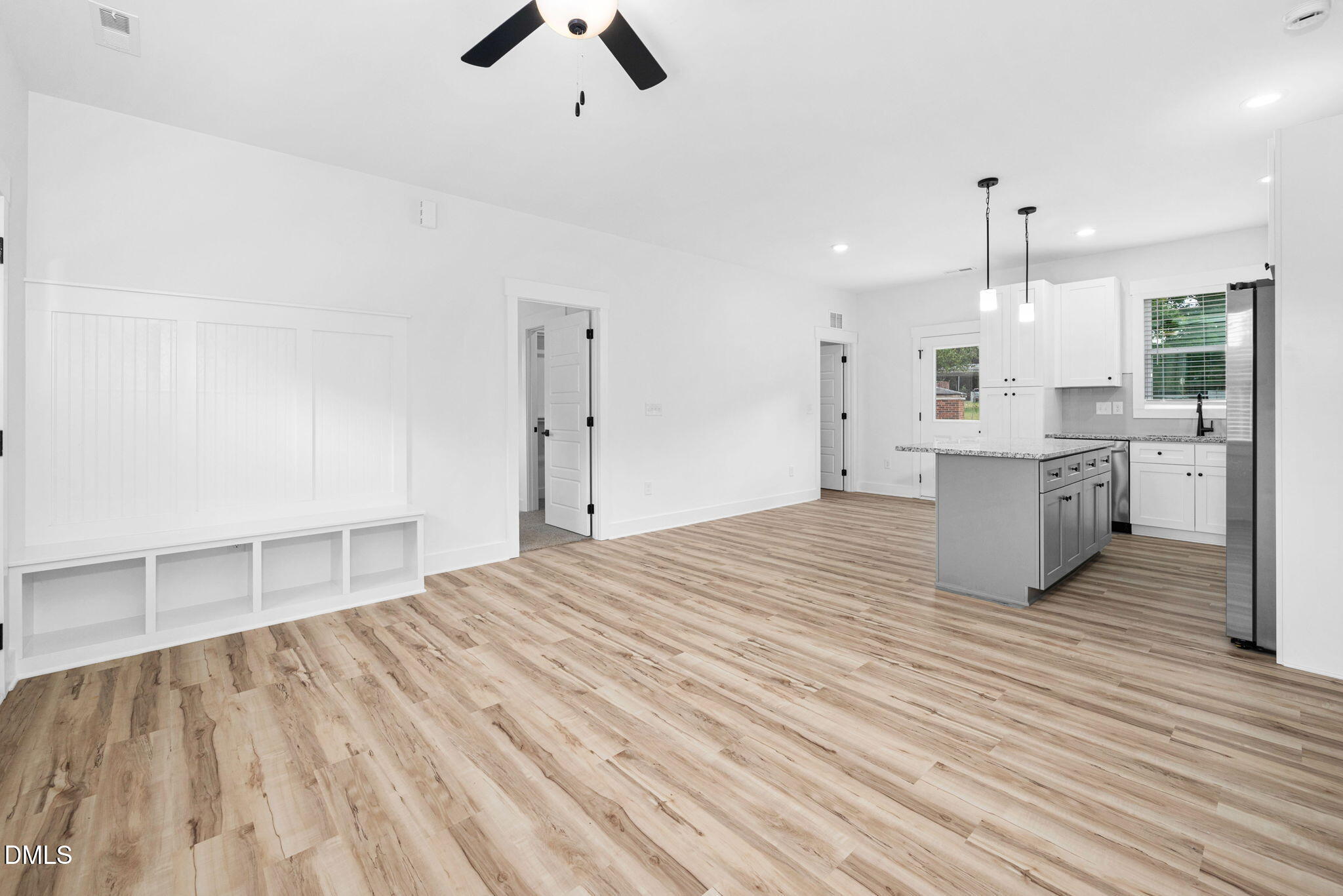 305 West Barden Street Roxboro, NC 27573 - Photo 10 of 31 a large kitchen with stainless steel appliances kitchen island a large island in the center