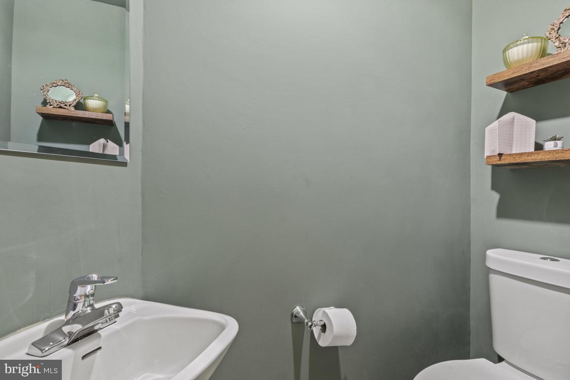 121 Gwynedd Manor Road North Wales, PA 19454 - Photo 21 of 59 Chic powder room with modern accents.