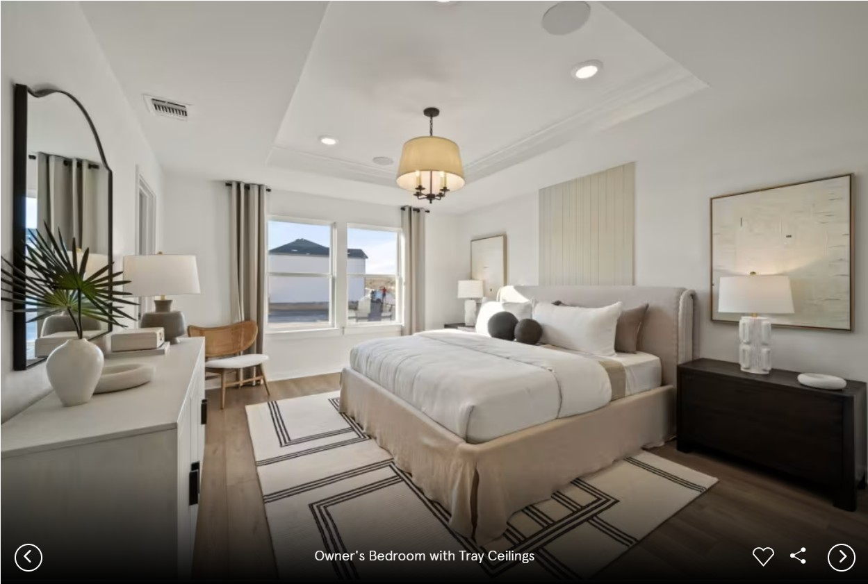 1363 Big Sky Road Belton, TX 76513 - Photo 6 of 8 a spacious bedroom with a bed and a chandelier