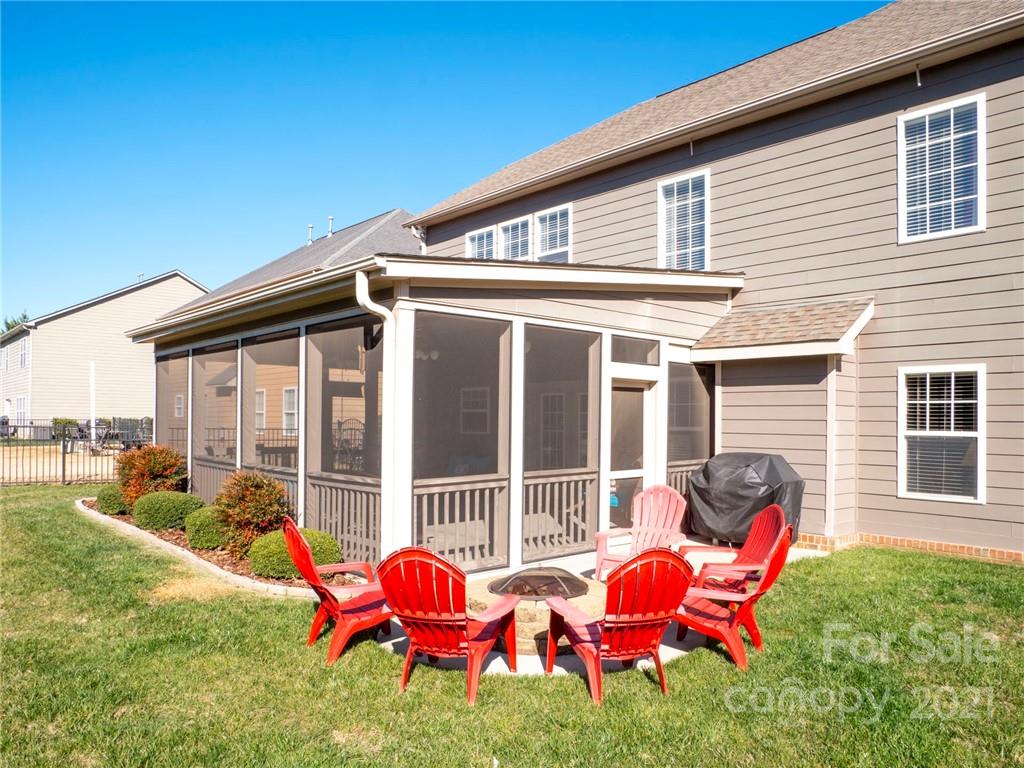 1012 Dunbarton Road Indian Trail, NC 28079 - Photo 40 of 48 a backyard of a house with seating space