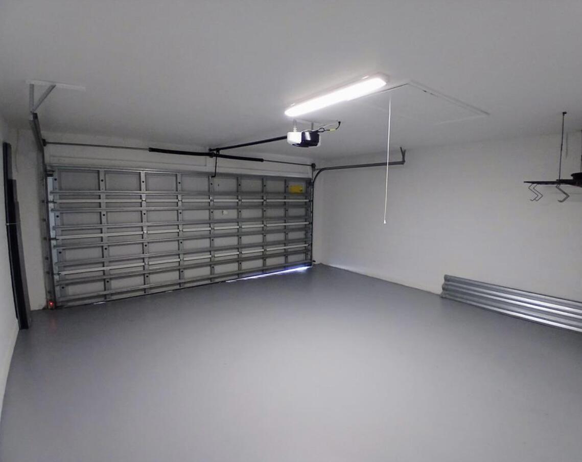 3450 Southwest Martin Street Port St. Lucie, FL 34953 - Photo 2 of 7 a view of a garage