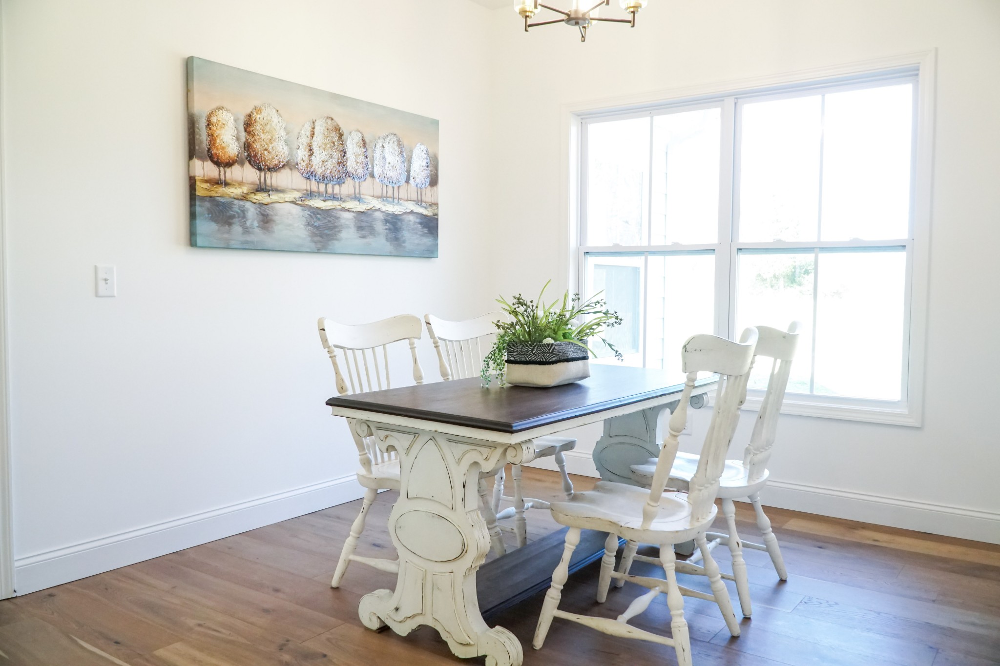 8203 Cookeville Boatdock Road Baxter, TN 38544 - Photo 14 of 64 a view of a dining room with furniture a potted plant and wooden floor