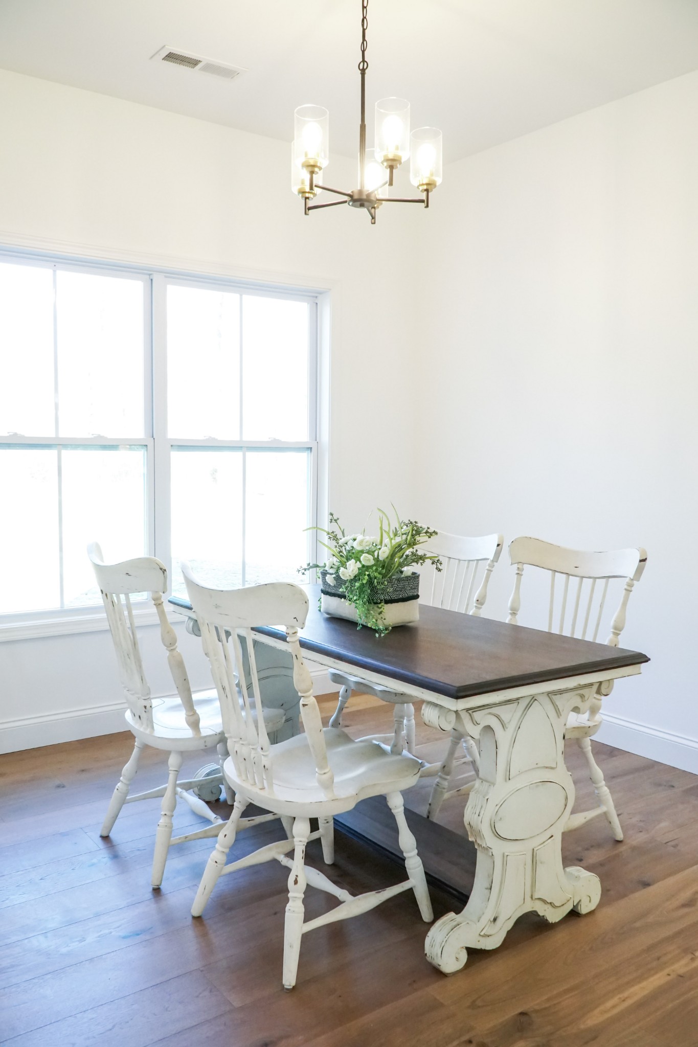 8203 Cookeville Boatdock Road Baxter, TN 38544 - Photo 15 of 64 a dining room with furniture a chandelier and wooden floor