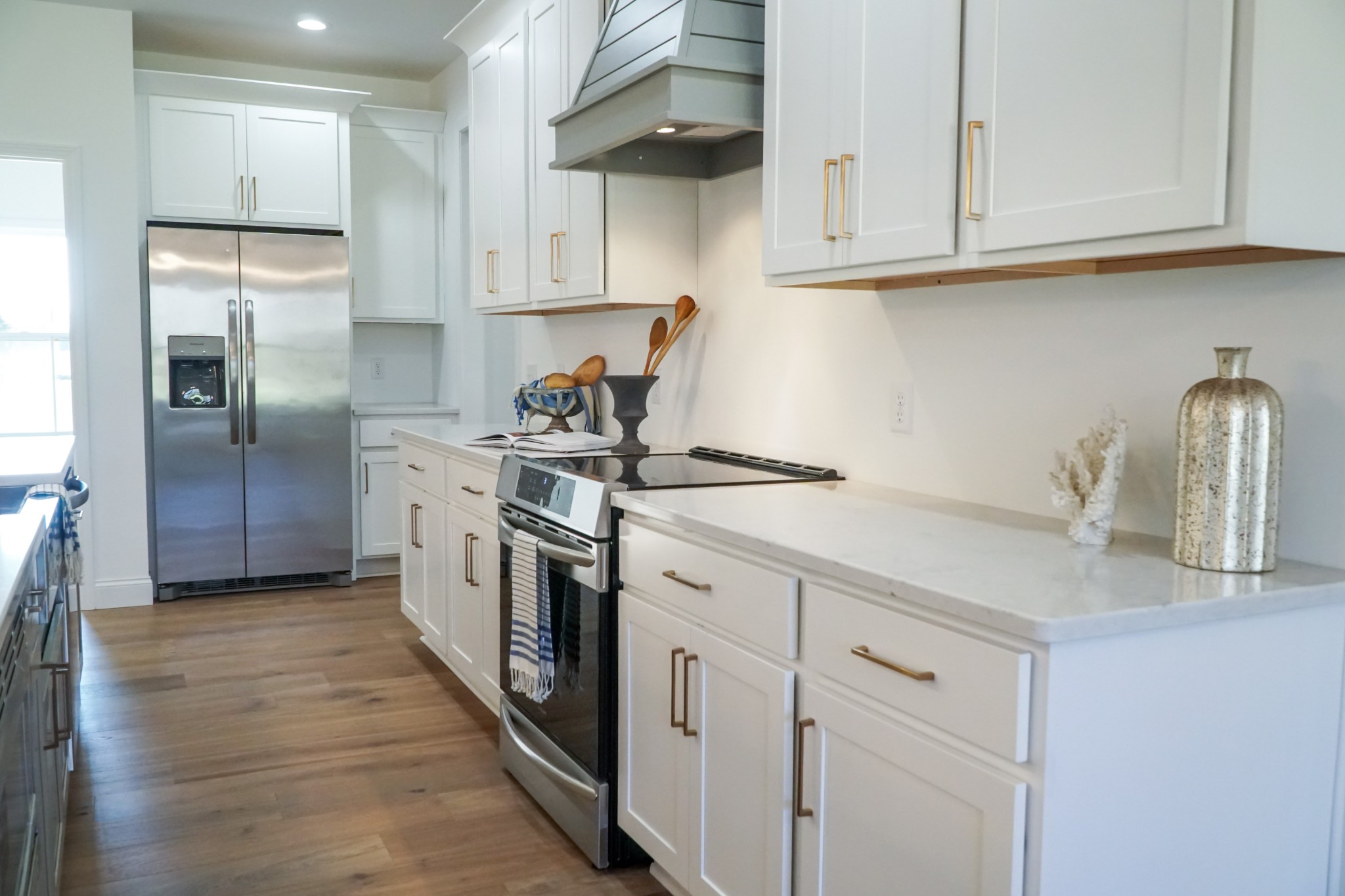 8203 Cookeville Boatdock Road Baxter, TN 38544 - Photo 17 of 64 a kitchen with stainless steel appliances granite countertop a sink and a refrigerator