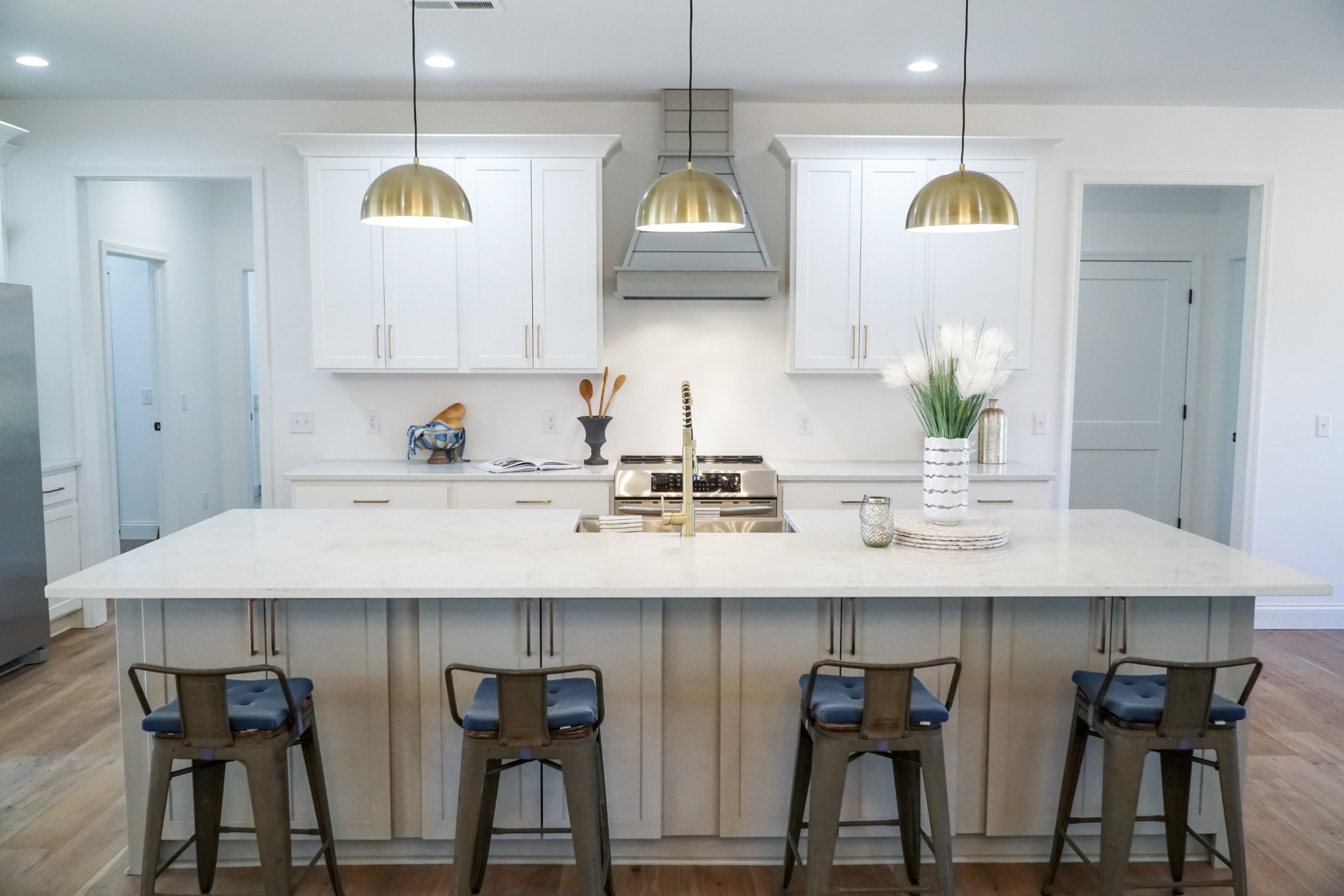 8203 Cookeville Boatdock Road Baxter, TN 38544 - Photo 25 of 64 a kitchen with stainless steel appliances a sink a stove a refrigerator a dining table and chairs