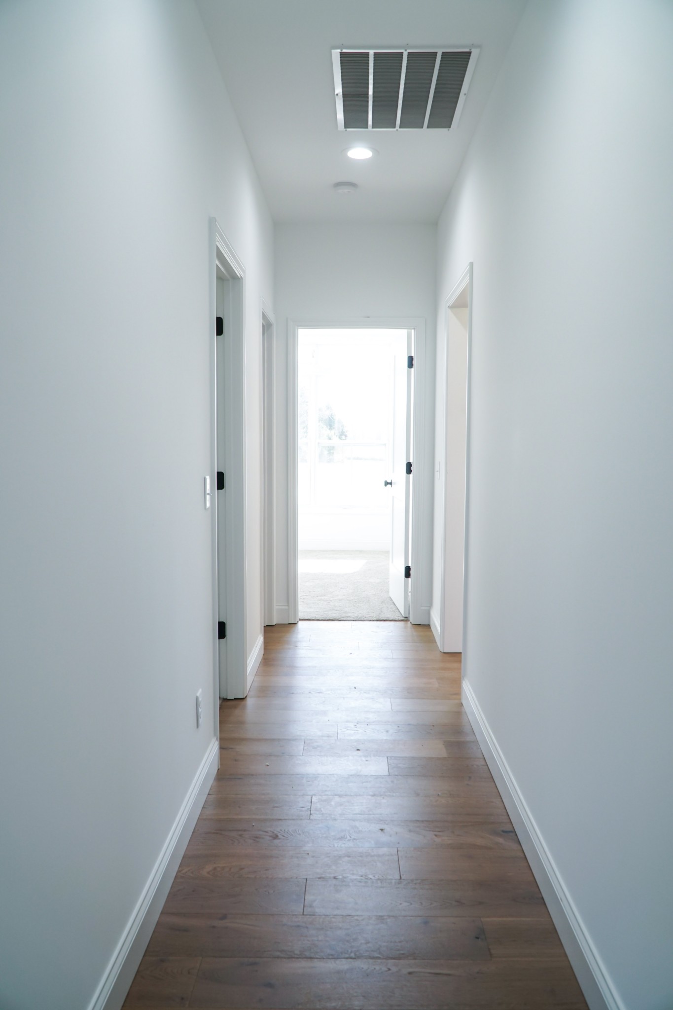 8203 Cookeville Boatdock Road Baxter, TN 38544 - Photo 56 of 64 a view of a hallway with wooden floor
