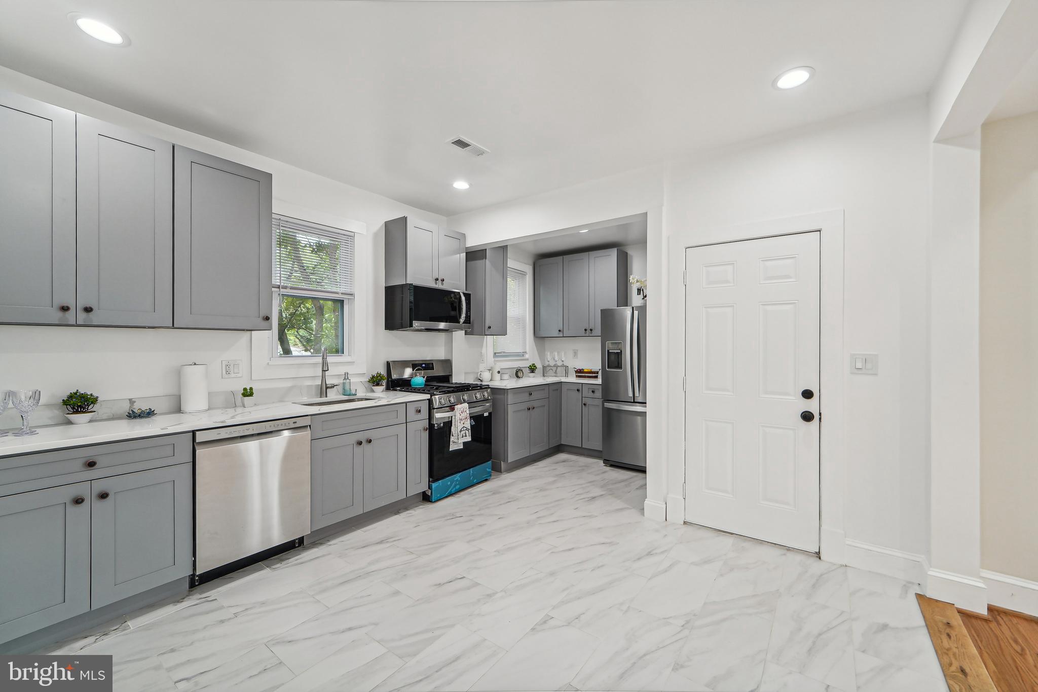 3911 Chatham Road Baltimore, MD 21207 - Photo 16 of 54 Balcony access from kitchen