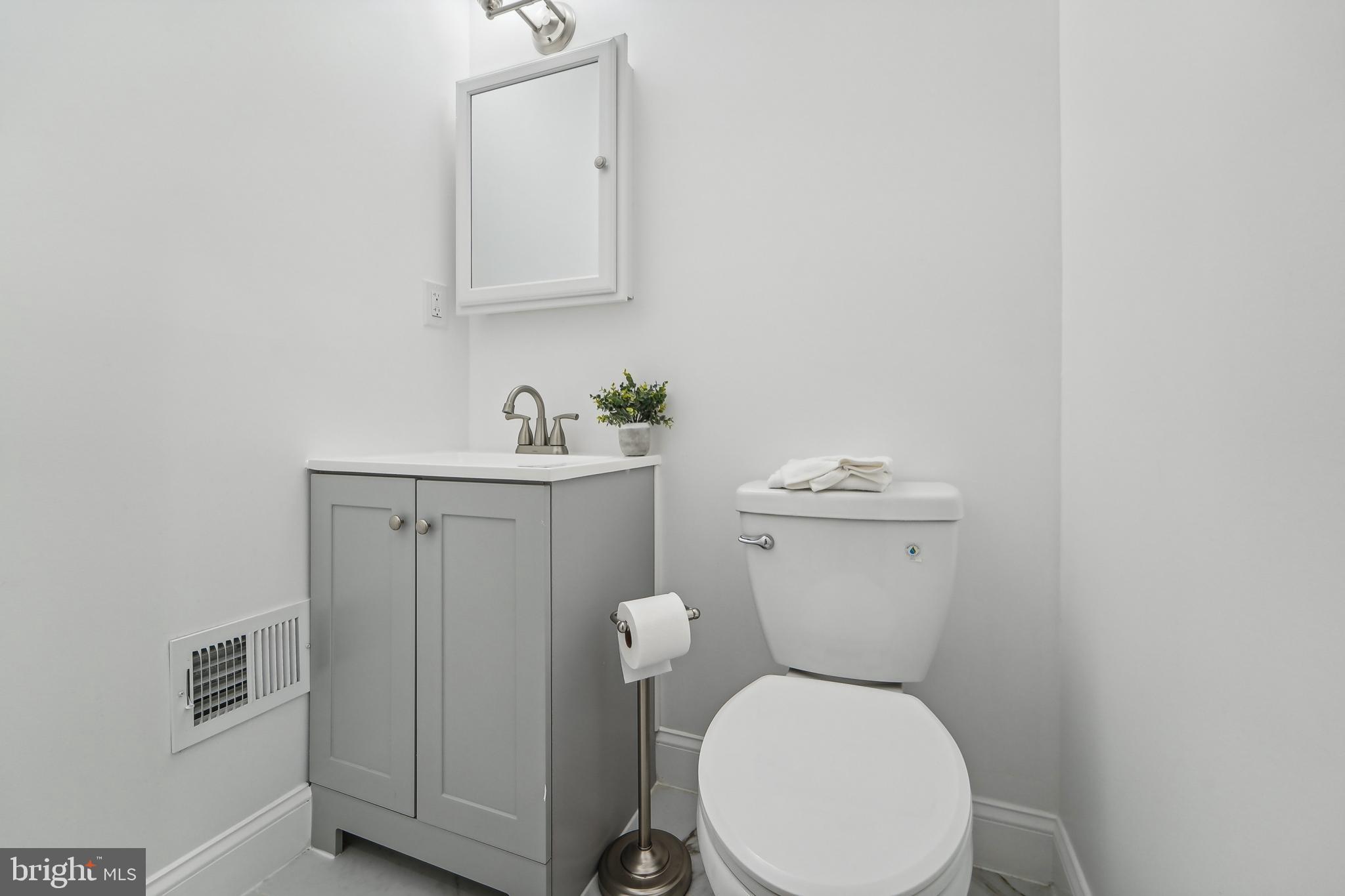3911 Chatham Road Baltimore, MD 21207 - Photo 34 of 54 Updated half bathroom