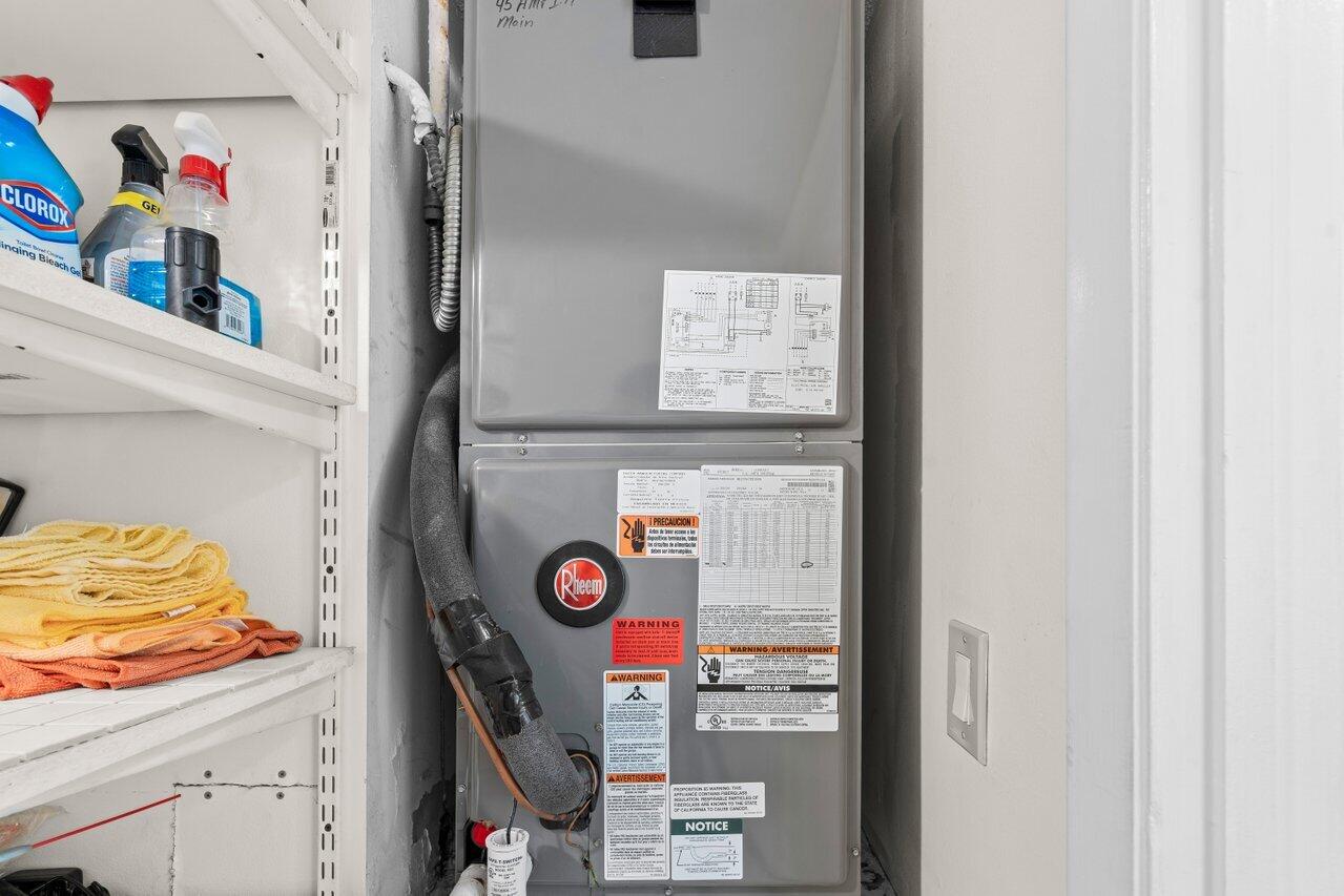 2070 Homewood Boulevard, Unit 4140 Delray Beach, FL 33445 - Photo 21 of 28 a view of storage and utility room