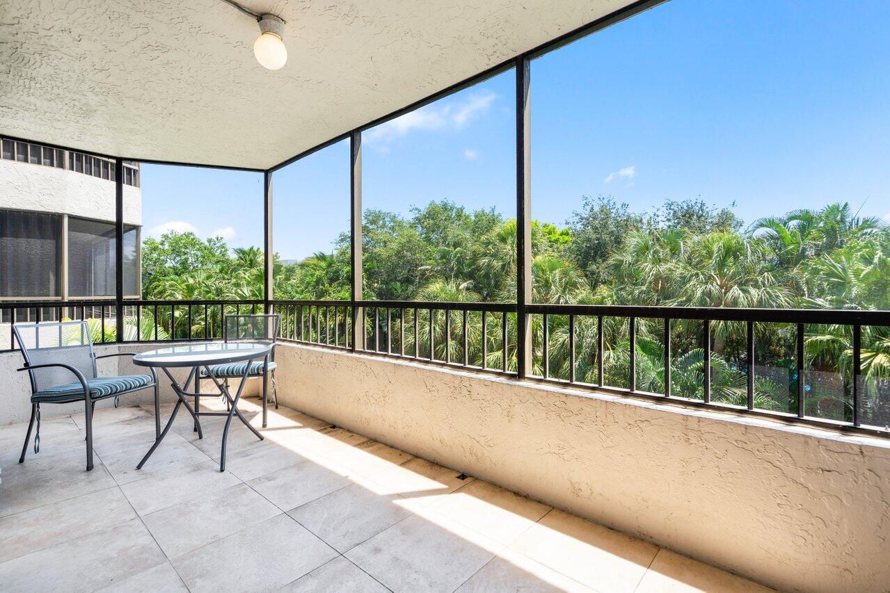 2070 Homewood Boulevard, Unit 4140 Delray Beach, FL 33445 - Photo 22 of 28 a view of balcony with furniture