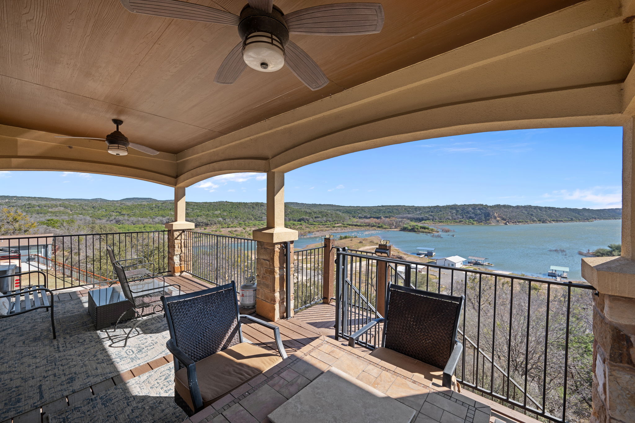1690 Hickory Creek Road Marble Falls, TX 78654 - Photo 17 of 25 View of patio with ceiling fan and a water view