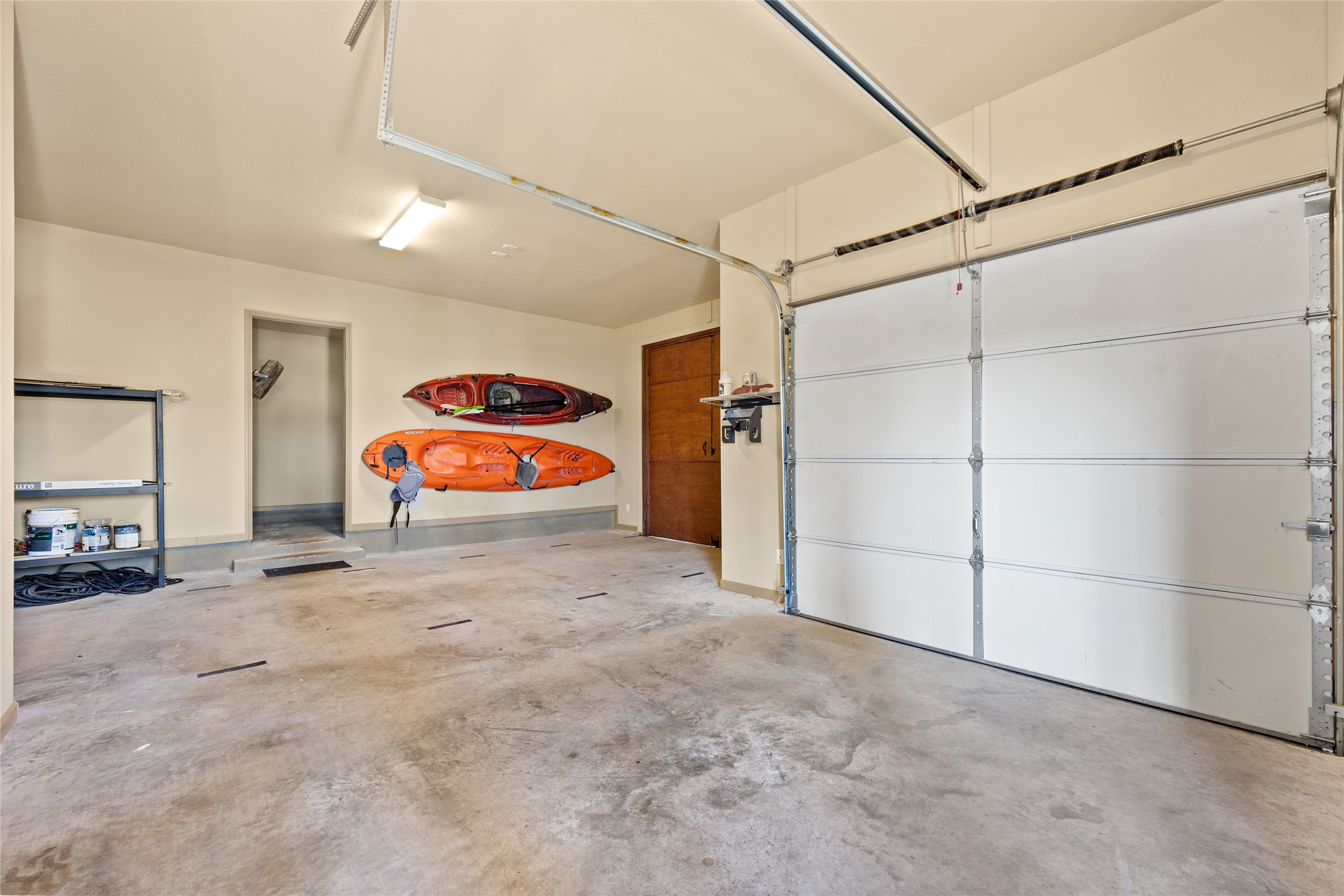 1690 Hickory Creek Road Marble Falls, TX 78654 - Photo 21 of 25 Garage featuring baseboards