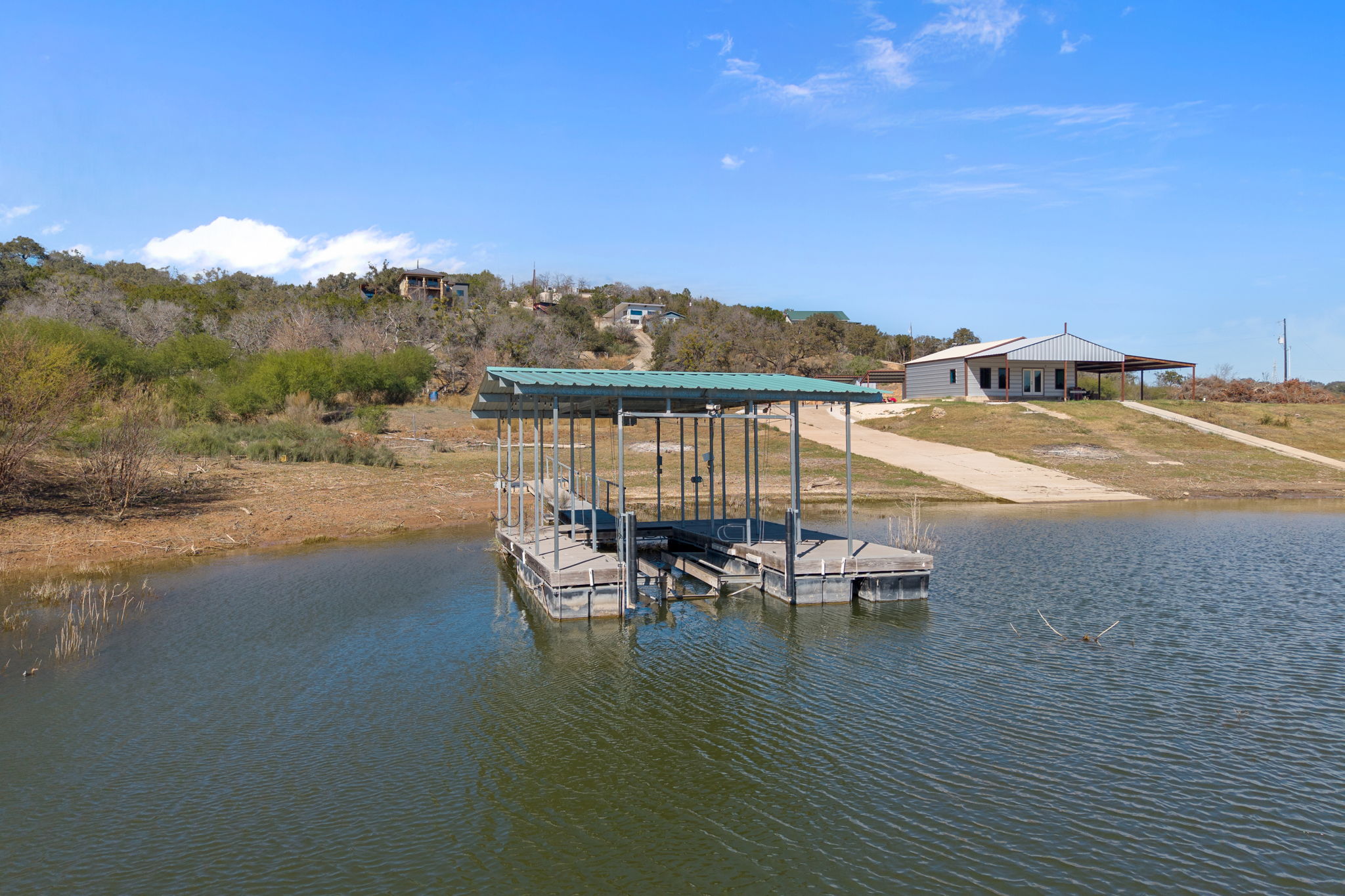 1690 Hickory Creek Road Marble Falls, TX 78654 - Photo 3 of 25 Dock area featuring a water view