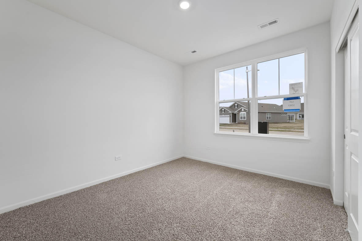 7676 West 106th Place Crown Point, IN 46307 - Photo 13 of 13 a view of an empty room with a window